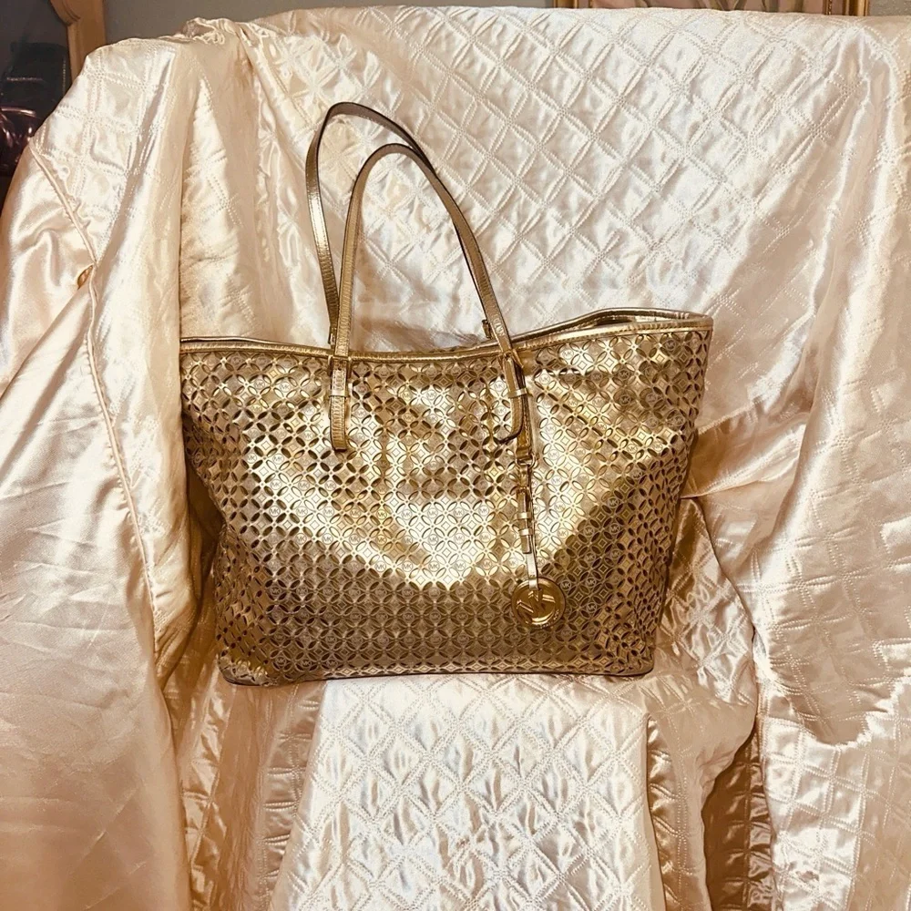 Michael Kors flower perforated travel tote